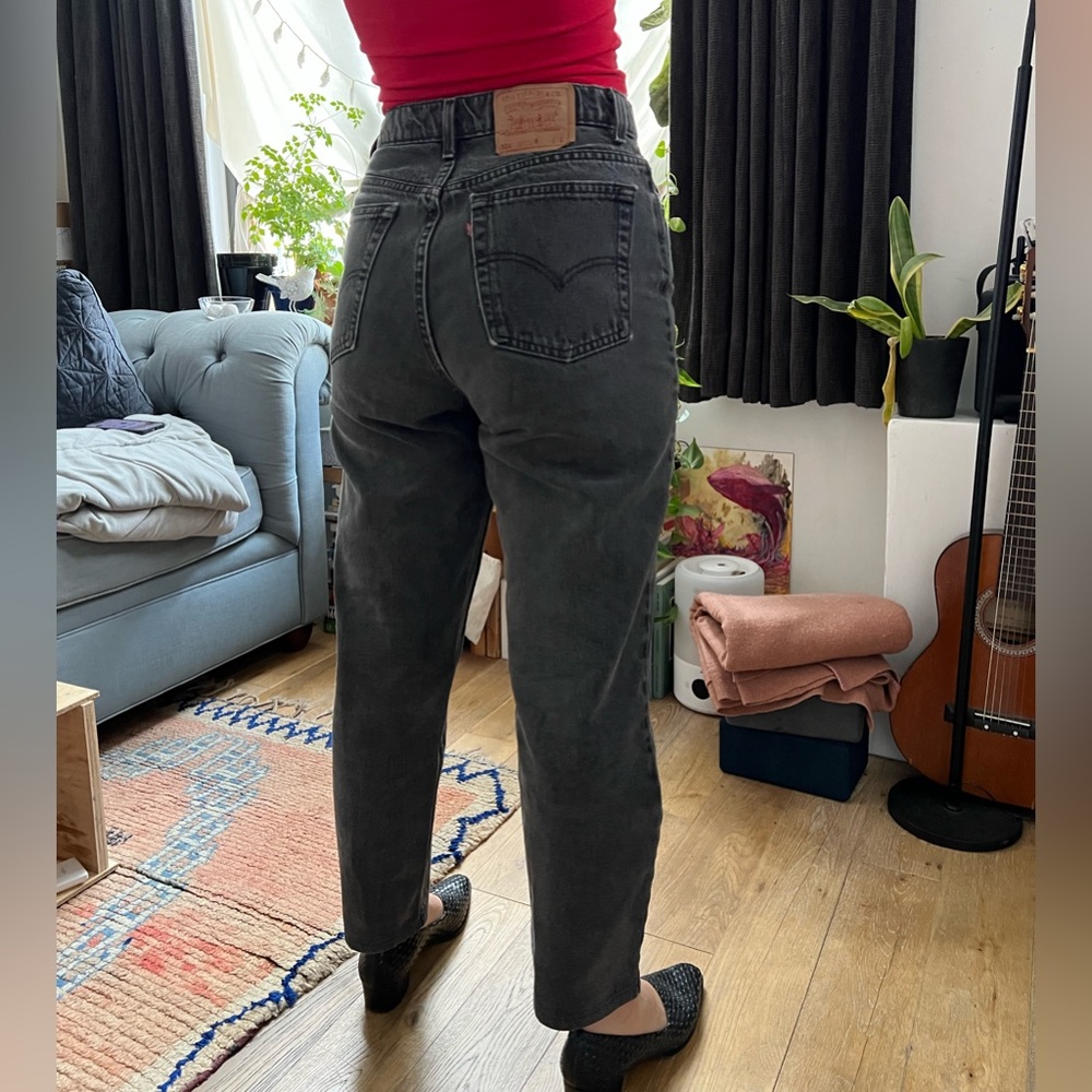 Vintage Levi’s 521 faded black tapered
